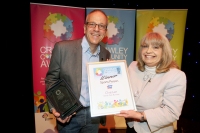 DM1617794a.jpg Crawley Community Awards 2016. Chris lee receives the Sports Person award from Gloria Newstead on behalf of K2. Photo by Derek Martin