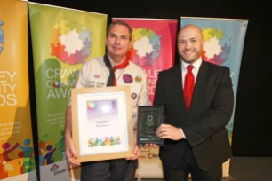 DM17311610a.jpg. Crawley Community Awards, 2017. Cllr Peter Lamb presents the Inspiration award to Scout Leader Paul Masters. Photo by Derek Martin